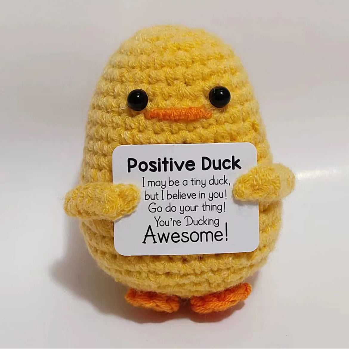 Crochet three small yellow ducks