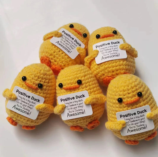 Crochet three small yellow ducks